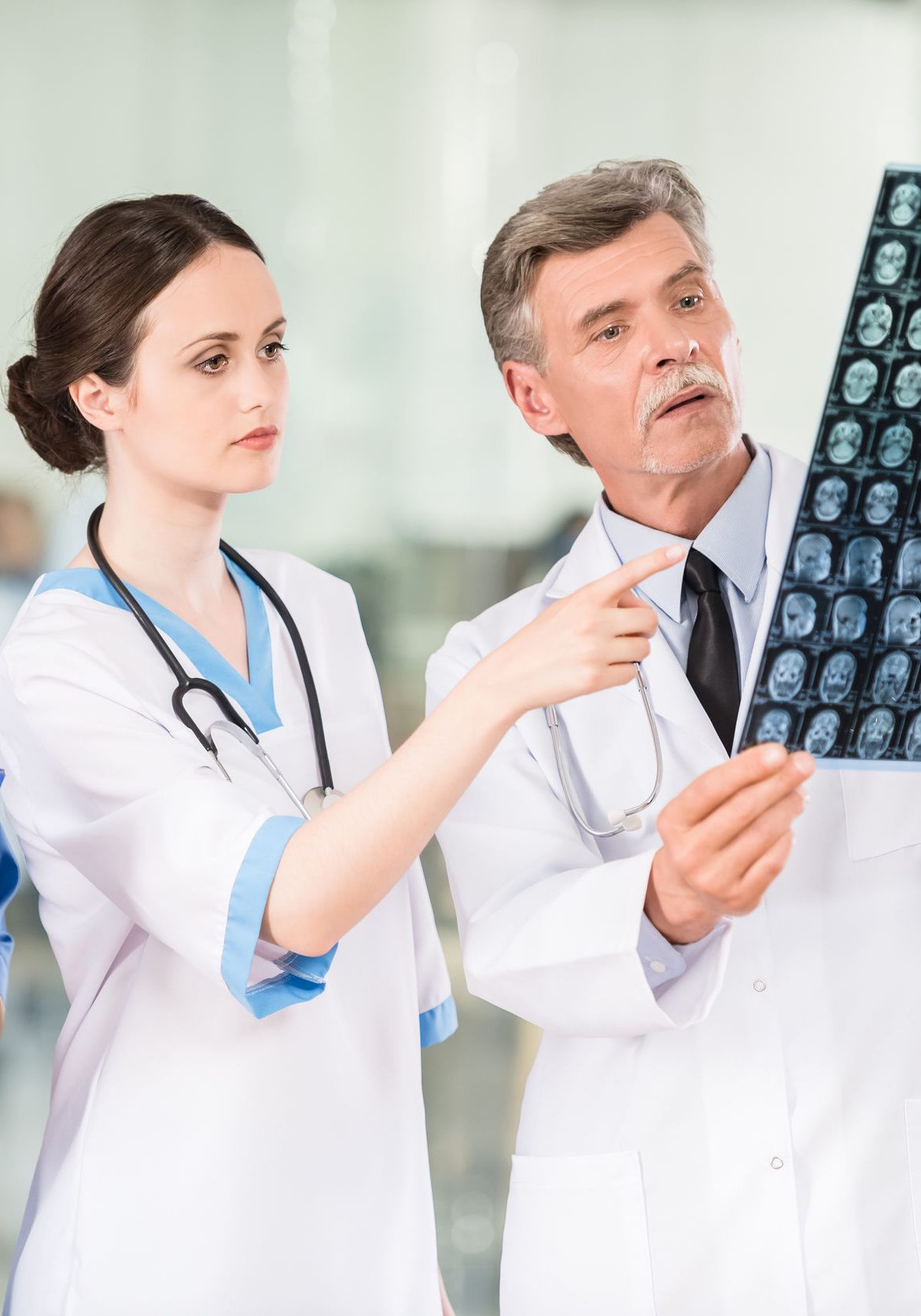 Doctors reviewing an X-ray after a catastrophic injury